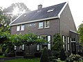 This is an image of rijksmonument number 478437 Orde en Tucht, a house at Van den Boschweg 11-13, Veenhuizen.