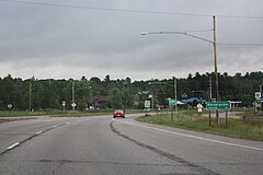 Looking east at the sign for Rhinelander on US 8