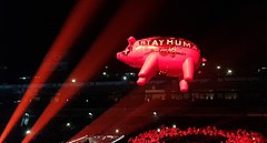 Photo d'un ballon gonflable en forme de cochon lors d'un concert de Roger Waters