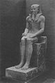 Estátua de pedra calcária de Sesóstris I no trono. Museu Egípcio no Cairo