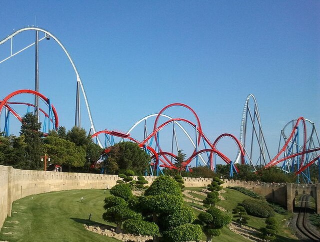 Two of B&M's roller coasters, Shambhala (back) and Dragon Khan (front) at PortAventura World in Spain