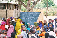 An outdoor school in Dadaab Somali school in Dadaab, Kenya refugee camp.jpg