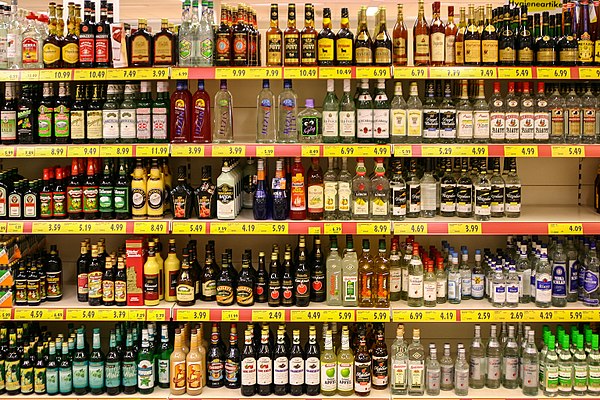 A display of various liquors in a supermarket