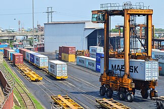 Straddle carrier work at Port of Chittagong.