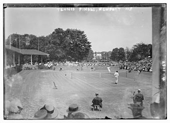 1913 men's final at Newport - McLoughlin serving Tennis Finals Newport 1913.jpg