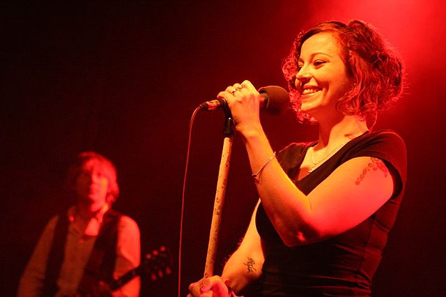 Lead female vocalists are a common presence in the gothic metal genre. One of the earliest was Anneke van Giersbergen of the Gathering, depicted above