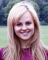 Tina O'Brien (pictured) plays Kylie's sister-in-law Sarah Platt. Kylie murders Callum Logan (Sean Ward) in order to protect the character. Tina O'Brien.jpg