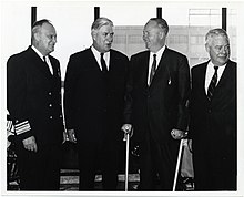 O'Neill with Boston Mayor John F. Collins (1960-1968). Tip O'Neill, member of the U.S. House of Representatives; Mayor John F. Collins; two unidentified men (12191716774).jpg