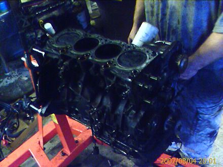 This is a 3S-GTE shortblock on an engine stand waiting to be cleaned. Toyota 3S-GTE shortblock before cleaning.jpg