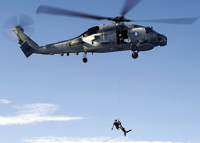 File:US Navy 060730-N-IJ727-011 An SH-60B Seahawk helicopter assigned to HSL-47 lowers a rescue swimmer.jpg