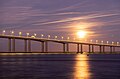 Image 1002Vasco da Gama bridge at sunset with the November 2016 supermoon in the background, Lisbon, Portugal