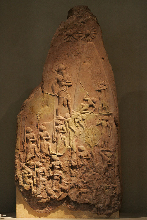 The Victory Stele of Naram-Sin (circa 2250 BC), commemorating the victory of Akkadian Empire king Naram-Sin (standing left) over Lullubi mountain trib