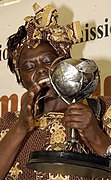 Maathai receives a trophy awarded to her by the Kenya national human rights commission, March 2006