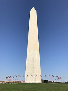 Washington Monument with American flags on a gorgeous Fall day.jpg
