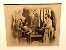 Victorian era photograph of women doing laundry taken by Oscar Rejoinder. An early photographer who recreated scenes in his studio based on activities he saw on the streets of London. Women in Victorian London washing (47050918051).jpg