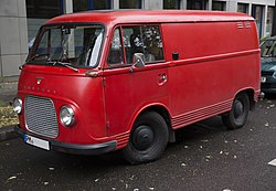 1965 Ford Taunus Transit in red, Berlin (front left).jpg