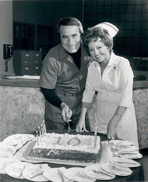John Beradino and Emily McLaughlin celebrating the 10th Anniversary of the show in 1973