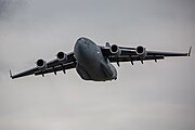 A Boeing C-17 Globemaster III, tail number 95-0103, taking off from RAF Mildenhall in the United Kingdom. It is assigned to the 62nd Airlift Wing and the 446th Airlift Wing at Joint Base Lewis McChord in Washington, USA.