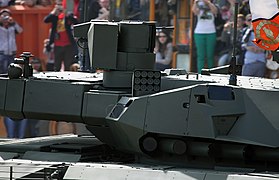 Close-up of the turret with its sensor and machine gun platform