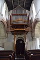 Organ at west end, blocking west window