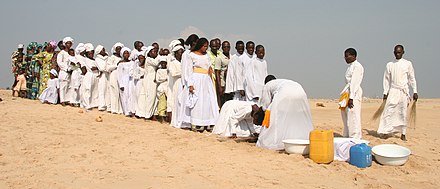 A Celestial Church of Christ baptism in Cotonou. 5% of Benin's population belongs to this denomination, an African Initiated Church.