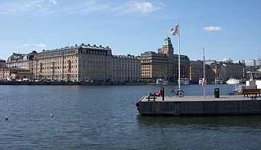 Bilden till vänster är en vy från Gustav III:s staty på Skeppsbron. Bilden till höger är en vy från Strandvägen, april 2009.