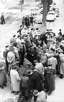 By 24 April 1956, the remains of the tunnel were being toured extensively by the Soviet and East German authorities Bundesarchiv Bild 183-37695-0038, Altglienicke, Sowjetische Offiziere und Vertreter der westlichen Presse.jpg