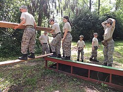 Civil Air Patrol Cadets navigate the conditioning course at Camp Atterbury. Cadets navigate Atterbury's conditioning course.jpg