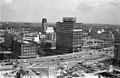 De naoorlogse Blaak met het Gerzongebouw links, op de hoek van de Korte Hoogstraat (voorheen Schiedamschedijk) in 1967.