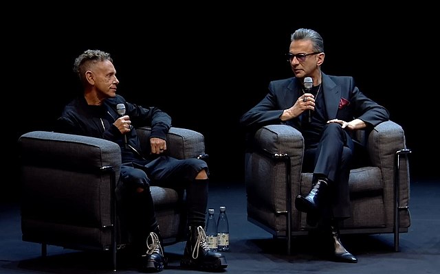 Gahan (right) with bandmate Martin Gore (left) at a press conference for their album Memento Mori in 2022