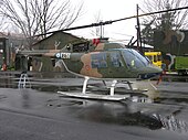 ES 511 Agusta Bell OH-58A Jet Ranger II of 3 TEAS at its base..jpg