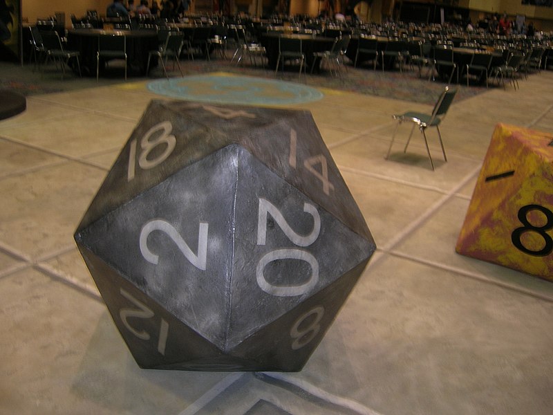 File:Enormous D20 and D8 relax near empty tables, Gen-Con 2007.jpg