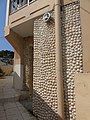 * Nomination: Facade made of shells of Bivalvia in Porto do Barqueiro, in Mañón (province of A Coruña, Galicia, Spain). --Drow male 07:56, 9 April 2019 (UTC) * Review If the slight noise under the balcony, and the edge CAs are fixed this would be a good and useful image. --Acabashi 10:33, 9 April 2019 (UTC)