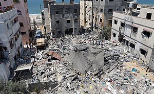 Разрушения после израильского авиаудара во время эскалации