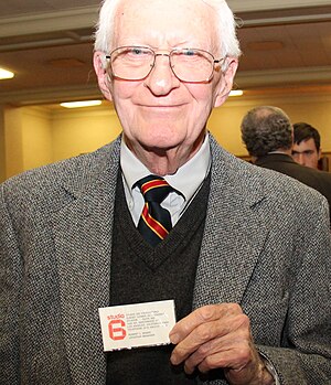 Robert Anders holding the phony business card that was part of the ploy that allowed him to escape from Iran