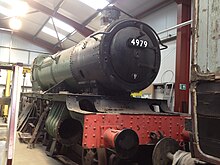 Wootton Hall standing inside the FRT shed awaiting restoration. GWR 4979 Wootton Hall awaiting restoration.JPG