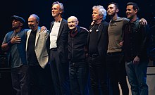 The band taking a bow at the final show Genesis - Last Domino Tour%3F - 26 March 2022.jpg