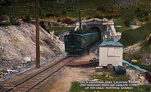 Great Northern boxcabs exiting the Cascade Tunnel. Great Northern electric locomotive Cascade Tunnel 1924.JPG