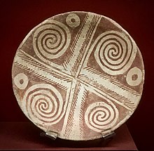 Unfolding Sacred Datura buds painted on a Hohokam Sacaton red-on-buff plate, ca. 950-1150 AD. This was a common decorative motif on ancient Native American pottery. Note the opening spiral of the bud on the photo at top of this page. Hohokam Sacaton red-on-buff plate, crica 950-1150 AD.JPG