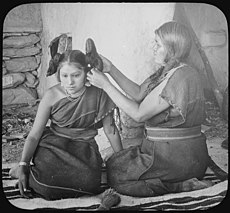 Hopi woman dressing hair of unmarried girl, 1900 - NARA - 520082.jpg