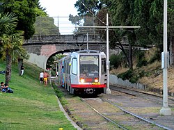 Inbound J Church train in Dolores Park, July 2017.JPG