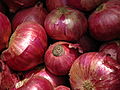 India - Koyambedu Market - Onions 08 (3987045248).jpg