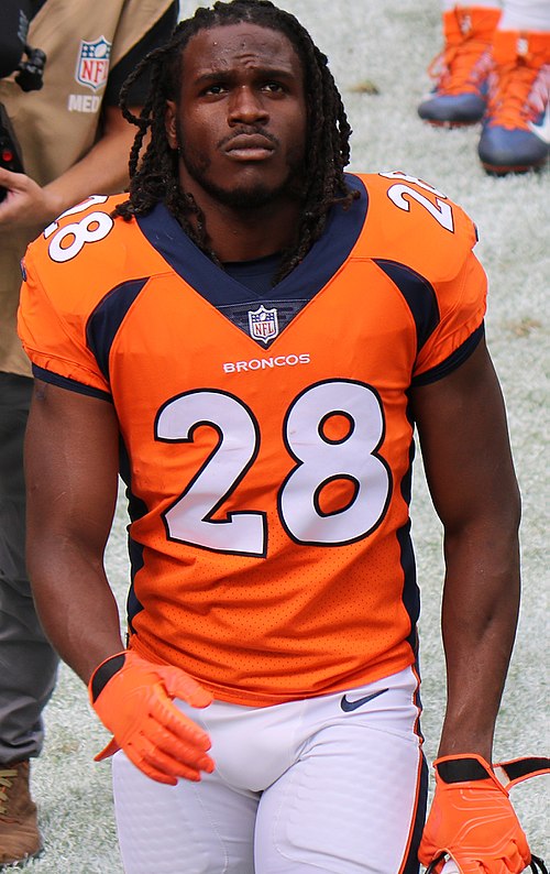 Charles with the Denver Broncos.