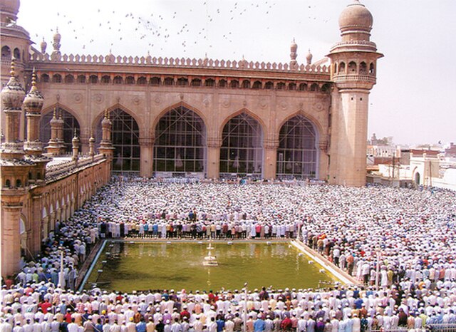 Muslims offer Friday Prayers at Mecca Masjid.