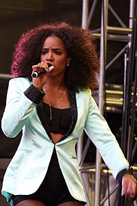 "Dilemma" by Nelly and Kelly Rowland (pictured) reached number-one in October and was the fourth best-selling single of the year. Kelly Rowland (7082267297).jpg