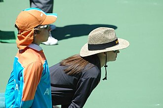 Ball boy (left) and line judge (right) during the 2005 Australian Open. Linesperson and ballboy 0484.jpg