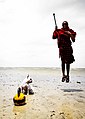 Masai Tribe Member on the Beach with a Kettlebell and French Bulldog.jpg