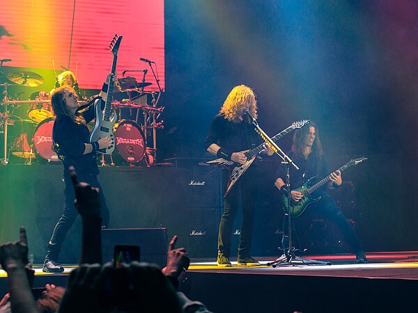 Megadeth performing in June 2018. Left to right: David Ellefson, Dirk Verbeuren, Dave Mustaine, and Kiko Loureiro.