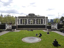 The north side of the colonnade and the entrance to the sunken garden. The bronze pool and compass is in the foreground.