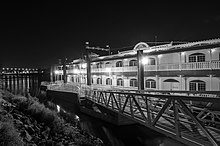 The Minnesota Centennial Showboat was anchored in the Mississippi River along Harriet Island Minnesota Centennial Showboat at night, October 2013.jpg